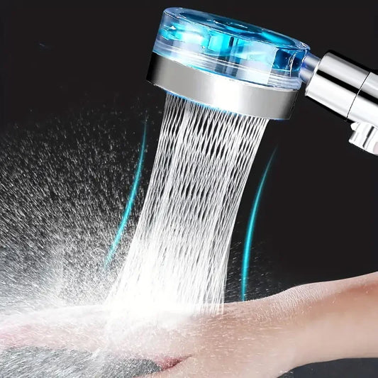 Studio Vela turbine shower head spraying high-pressure water